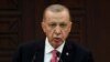 FILE PHOTO: : Turkish President Tayyip Erdogan announces new cabinet during a press conference, in Ankara