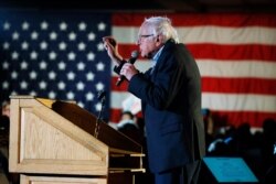 FILE - Democratic presidential candidate Sen. Bernie Sanders of Vermont speaks during his Bernie's Big New Year's Bash, Dec. 31, 2019, in Des Moines, Iowa.