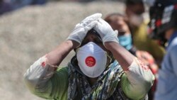 VOA Asia - COVID aid rushes to India