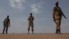 Sudan People's Liberation Army (SPLA) soldiers guard the airport in Malakal, Jan. 21, 2014. 