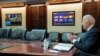 U.S. President Joe Biden is seen in a White House handout photo as he speaks with European leaders about Russia and the situation in Ukraine during a secure video teleconference from the Situation Room of the White House in Washington, Jan. 24, 2022. 