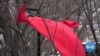 Forty red dresses hang outside of the National Museum of the American Indian in Washington. They're present 24 hours a day, in all weather, to draw attention to the plight of missing and murdered indigenous women who experience violence at a higher rate than non-indigenous women.