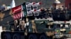 FILE - A missile is loaded on a vehicle during the Pakistan National Day parade in Islamabad, Pakistan, in March 2015. Pakistan's nuclear arsenal is on track to be the third largest in the world, one U.S. lawmaker said Wednesday.