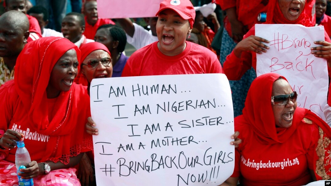 Women attend a demonstration calling on the government to rescue the kidnapped school girls of a government secondary school Chibok, outside the defense headquarters in Abuja, Nigeria, May 6, 2014. 