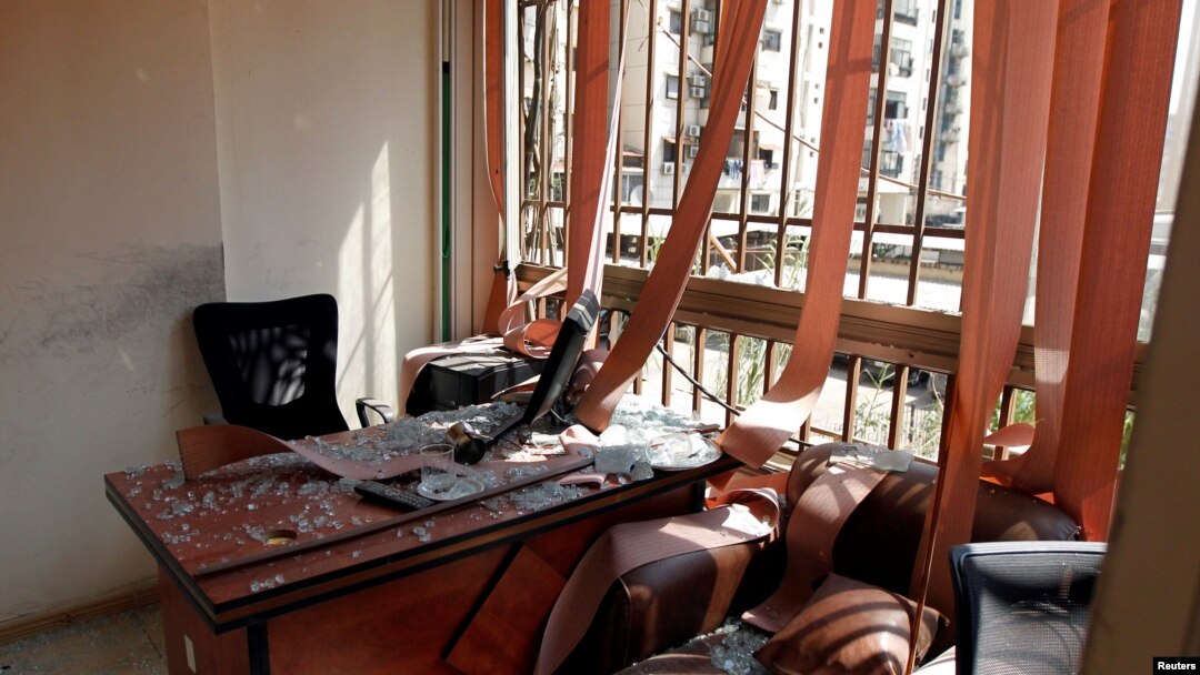 Damage and glass from broken windows is seen inside Hezbollah media center after an Israeli drone fell in the Hezbollah-dominated southern suburbs of Beirut, Lebanon, Aug. 25, 2019. 