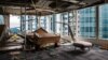 Panels and debris from a collapsed ceiling are seen with blown over pieces of furniture in a company office, in a harbourside commercial building, whose windows were blown out the day before during Typhoon Mangkhut in Hong Kong on September 17, 2018.
