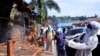 Ugandan health officials wearing protective gear disinfect the Nakawa open-air market as part of the measures to prevent the spread of the coronavirus disease (COVID-19), in Nakawa division of Kampala, April 17, 2020.