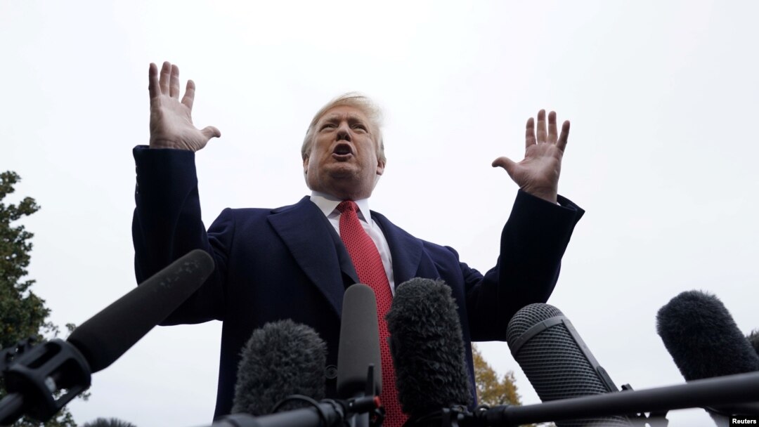FILE - U.S. President Donald Trump talks to reporters from the South Lawn of the White House in Washington, Nov. 9, 2018.