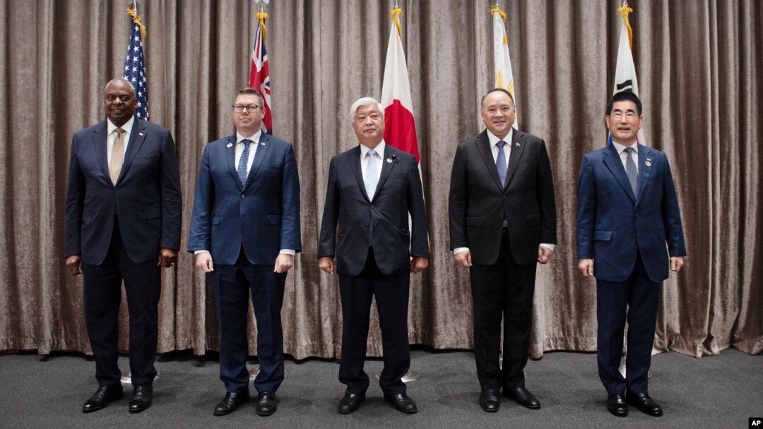 Defense ministers Lloyd Austin of the U.S., Pat Conroy of Australia, Gen Nakatani of Japan, Gilberto C. Teodoro Jr. of the Philippines and Kim Yong Hyun of South Korea pose during an ASEAN meeting in Vientiane, Laos, Nov. 21, 2024. (South Korean Defense Ministry via AP)