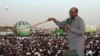 President Omar Hassan al-Bashir addresses a crowd, orders stoppage of all South Sudan's oil exports, in North Khartoum, Sudan, June 8, 2013.