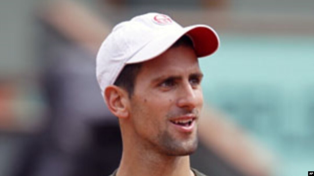 Novak Djokovic of Serbia attends a training session two days before the French Open tennis tournament at the Roland Garros stadium in Paris, May 20, 2011