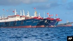 Tàu Trung quốc neo tại Đá Ba Đầu, Biển Đông hôm 27/3/2021. Manila nói hơn 250 tàu TQ đã kéo vào vùng biển này của Philippines hôm 31/3. Ảnh do Lực lượng Đạc nhiệm Quốc gia, biển Tây Philippines cung cấp. 