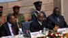 From left, Kenyan President Uhuru Kenyatta, Ugandan President Yoweri Museveni and Central African Republic President Michel Djotodia attend Heads of States and Governments International Conference on the Great Lakes Region, Nairobi, July 31, 2013.