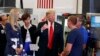 President Donald Trump participates in a tour of an advanced manufacturing lab with Ivanka Trump, second from left, and Gov. Kim Reynolds, R-Iowa, third from left, at Northeast Iowa Community College in Peosta, Iowa, July 26, 2018. 