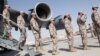FILE - Turkish troops arrive at their military base in Doha, Qatar, June 23, 2017. 