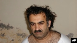 FILE - Khalid Sheikh Mohammed is seen after his capture, March 1, 2003, in this photo obtained by the Associated Press. On Tuesday, the Biden administration asked a federal appeals court to block a plea agreement for the accused mastermind of the Sept. 11, 2001, attacks.