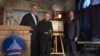 Dutch ambassador Henne Schuwer, left, with recipients of the 2017 Anne Frank Award: the Rev. Leo J. O'Donovan, center, on behalf of the Jesuit Refugee Service, and Robert Quinn, founding executive director of Scholars at Risk.