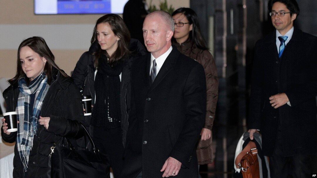 Deputy U.S. trade representative Jeffrey D. Gerrish, center, and members of his delegation leave the Westin hotel in Beijing, China, Jan. 7, 2019, for talks with their Chinese counterparts.