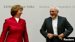 Yevropa Ittifoqi Tashqi ishlar vaziri Ketrin Eshton, Eron Tashqi ishlar vaziri Javod Zarif. Jeneva, 7-noyabr, 2013-yil.