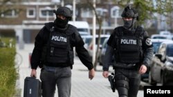 Police officers are seen after a shooting in Utrecht, Netherlands, March 18, 2019.