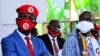 Ugandan musician turned politician, Robert Kyagulanyi, also known as Bobi Wine and four time Presidential candidate Kizza Besigye attend a joint news conference in Wakiso district, in Kampala, June 15, 2020. 