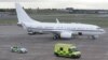An ambulance carrying injured Pakistani teenager Malala Yousufzai leaves Birmingham airport, England on Oct. 15, 2012.