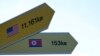 Destination signs to North Korea's capital, Pyongyang, and the United States are seen at the Imjingak Pavilion in Paju, near the border with North Korea, South Korea, Jan. 14, 2022.