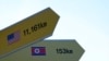 Destination signs to North Korea's capital, Pyongyang, and the United States are seen at the Imjingak Pavilion in Paju, near the border with North Korea, South Korea, Jan. 14, 2022.