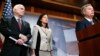 FILE - From left, Republican U.S. Senators John McCain of Arizona, Kelly Ayotte of New Hampshire and Lindsey Graham of South Carolina talk to reporters on Capitol Hill about legislation aimed at restricting prisoner transfers from Guantanamo Bay, Jan. 13, 2015.