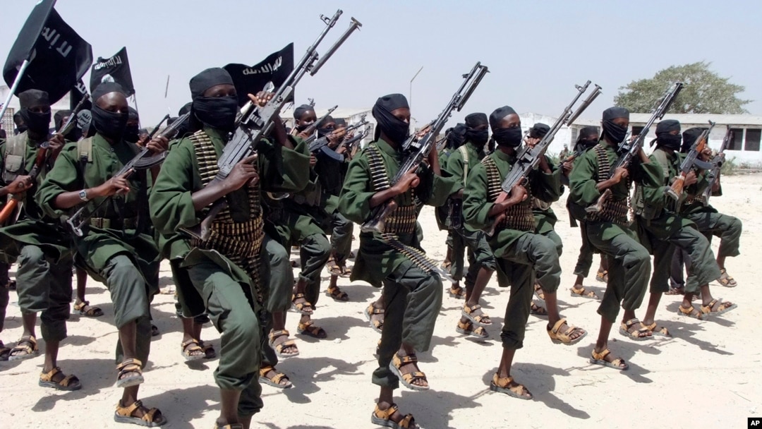 FILE - Newly trained al-Shabab fighters participate in military exercises in the Lafofe area, south of Mogadishu, in Somalia, Feb. 17, 2011. 