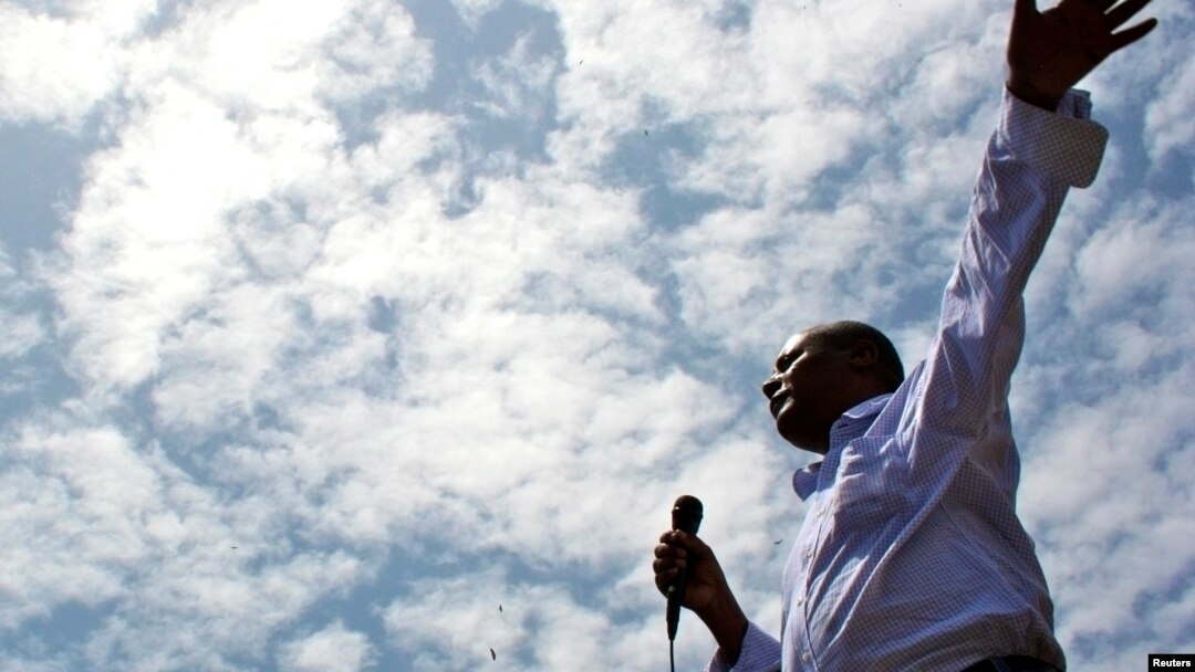 FILE - Merera Gudina, a leader of Ethiopia's biggest opposition coalition, Medrek, addresses supporters at a rally in the Oromia region, May 15, 2010.