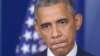 President Barack Obama pauses while speaking in the James Brady Press Briefing Room at the White House in Washington, Aug. 1, 2014. 