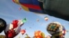 FILE - Thousands of spectators mingle among inflating hot air balloons at the 40th Albuquerque International Balloon Fiesta in Albuquerque, N.M., Oct. 2, 2011.
