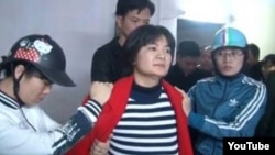 Nhà hoạt động Trần Thị Nga bị bắt giữ ở Phủ Lý, Hà Nam, ngày 21 tháng 1, 2017.
