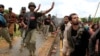 Soldiers from the Pakistan Rangers stop demonstrators during the Revolution March in Islamabad, Sept. 1, 2014.