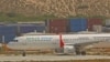 An aircraft belonging to Daallo Airlines is parked at the Aden Abdulle international airport after making an emergency landing following an explosion inside the plane in Somalia's capital Mogadishu, Feb. 3, 2016. 