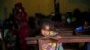  A Muslim child sits inside the St. Pierre church where she and hundreds of other Muslims are seeking refuge in Boali, Central African Republic, some 80kms (50 miles) north-west of Bangui, Thursday, Jan. 23, 2014. Clashes erupted between Anti-Balaka Chri