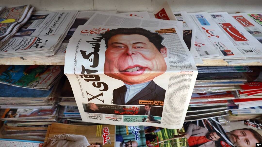 A copy of Iran's Farhikhtegan newspaper sits in a kiosk in Tehran on Nov. 16, 2024, with a drawing of Elon Musk on its front page, as Iranian media referred to a reported meeting between Tehran's ambassador to the United Nations and the tech billionaire earlier this week.