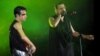 Exiled Iranian rock musician Shahin Najafi, right, sang alongside Israeli rock star Aviv Geffen, left, at a concert in Tel Aviv -- the first performance by an Iranian artist at an Israeli rock concert -- on March 2, 2017.
